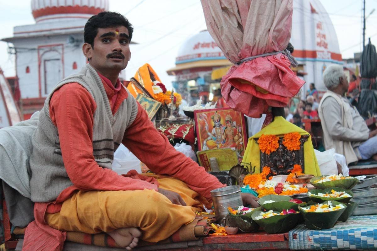 People sitting outside Uttarakhand Temple